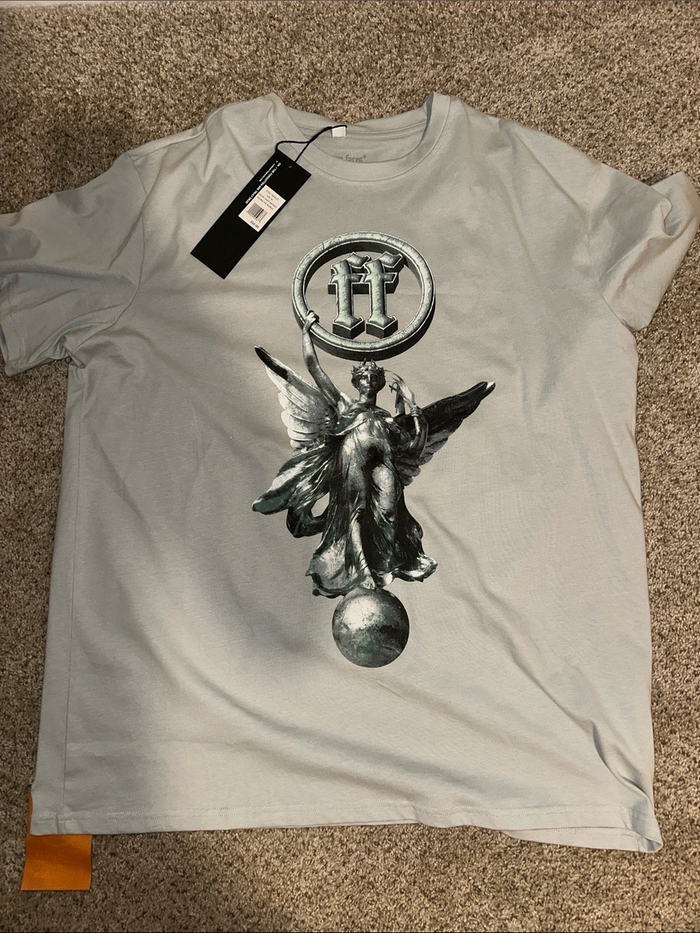 Ruling the World Graphic Tee with Metallic Emblem